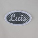 Oval patch with embroidered name